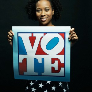 Patriotic Woman Holding "Vote" Placard